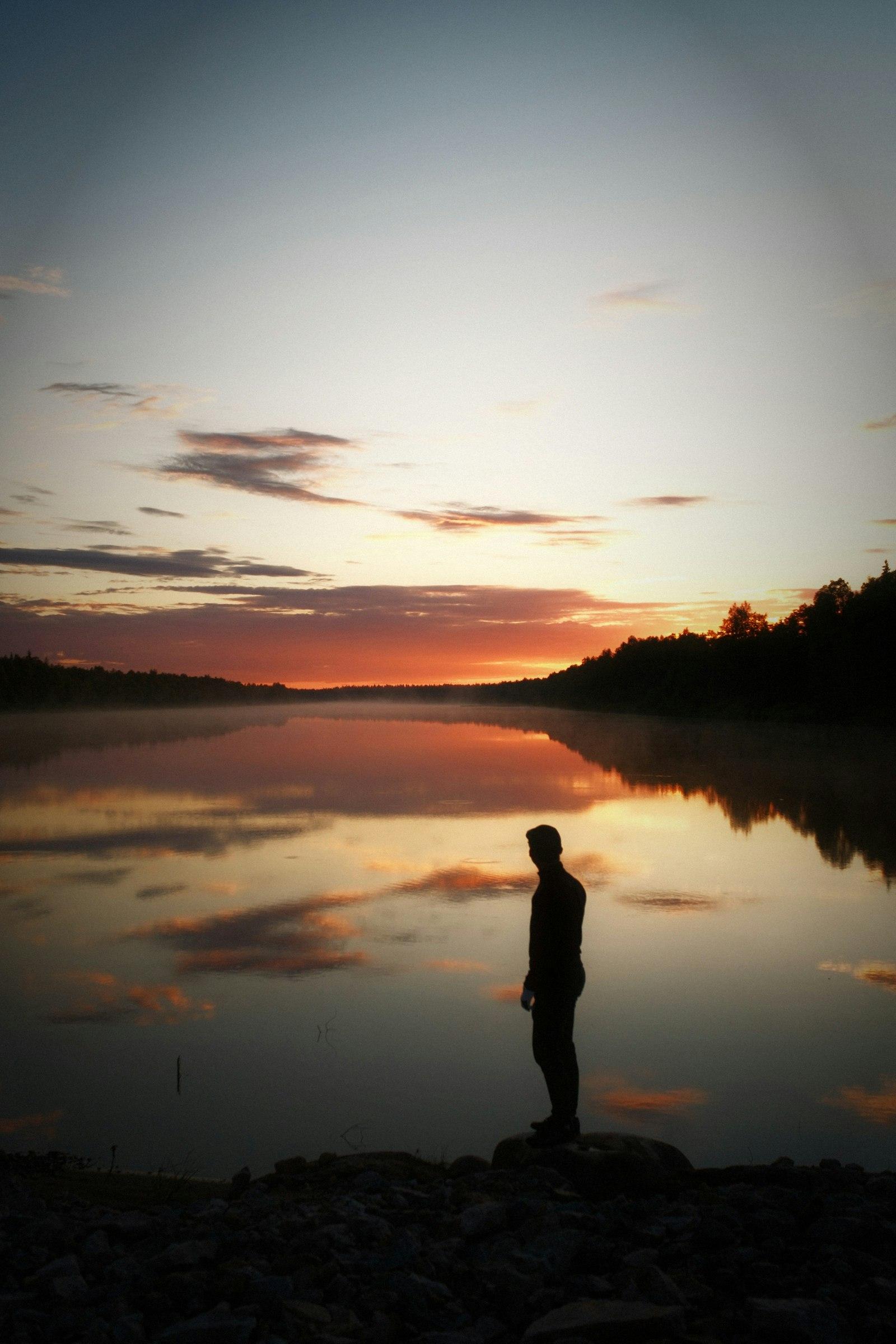 A calm lake at sunset in Levi