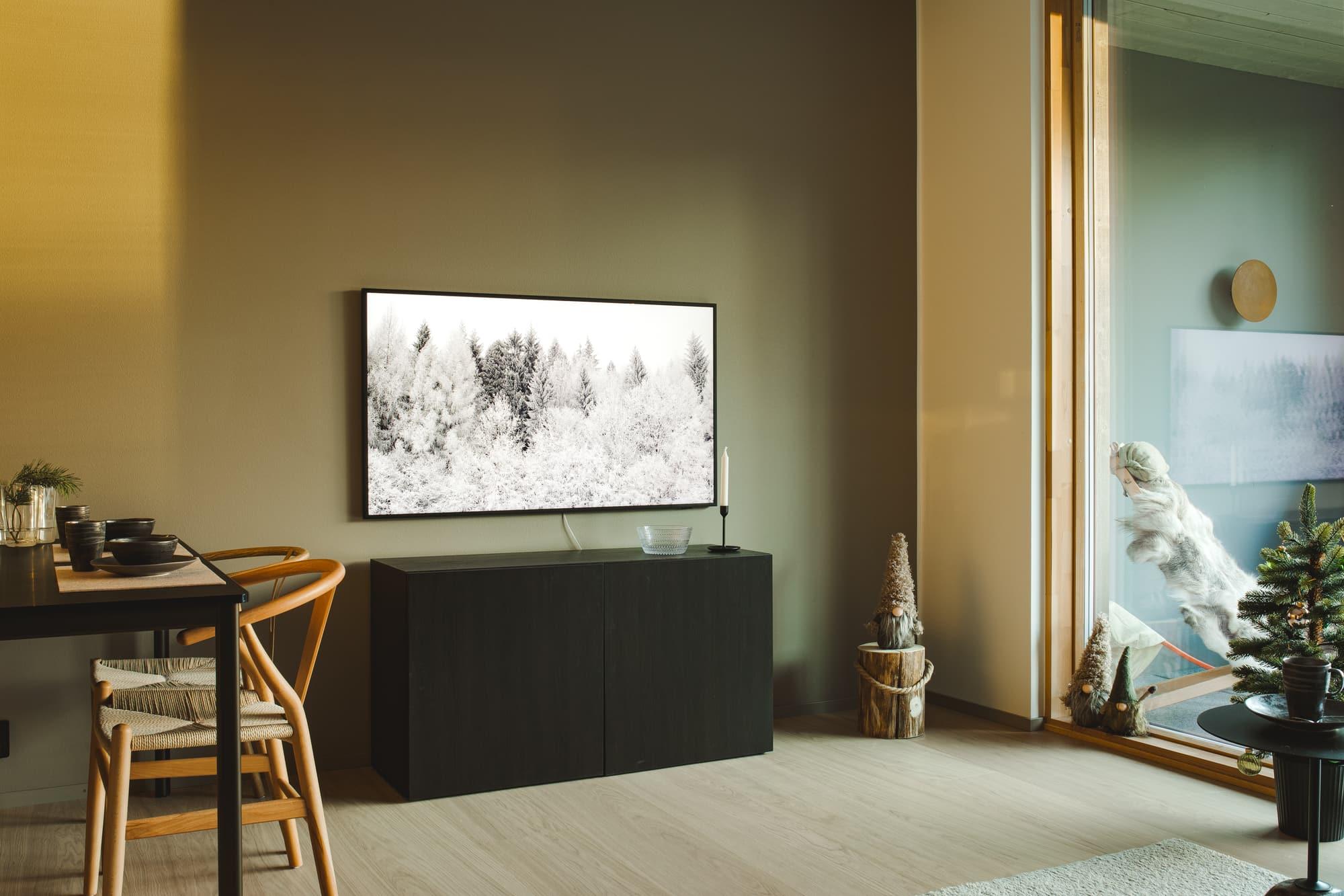 Living room with television and dining area