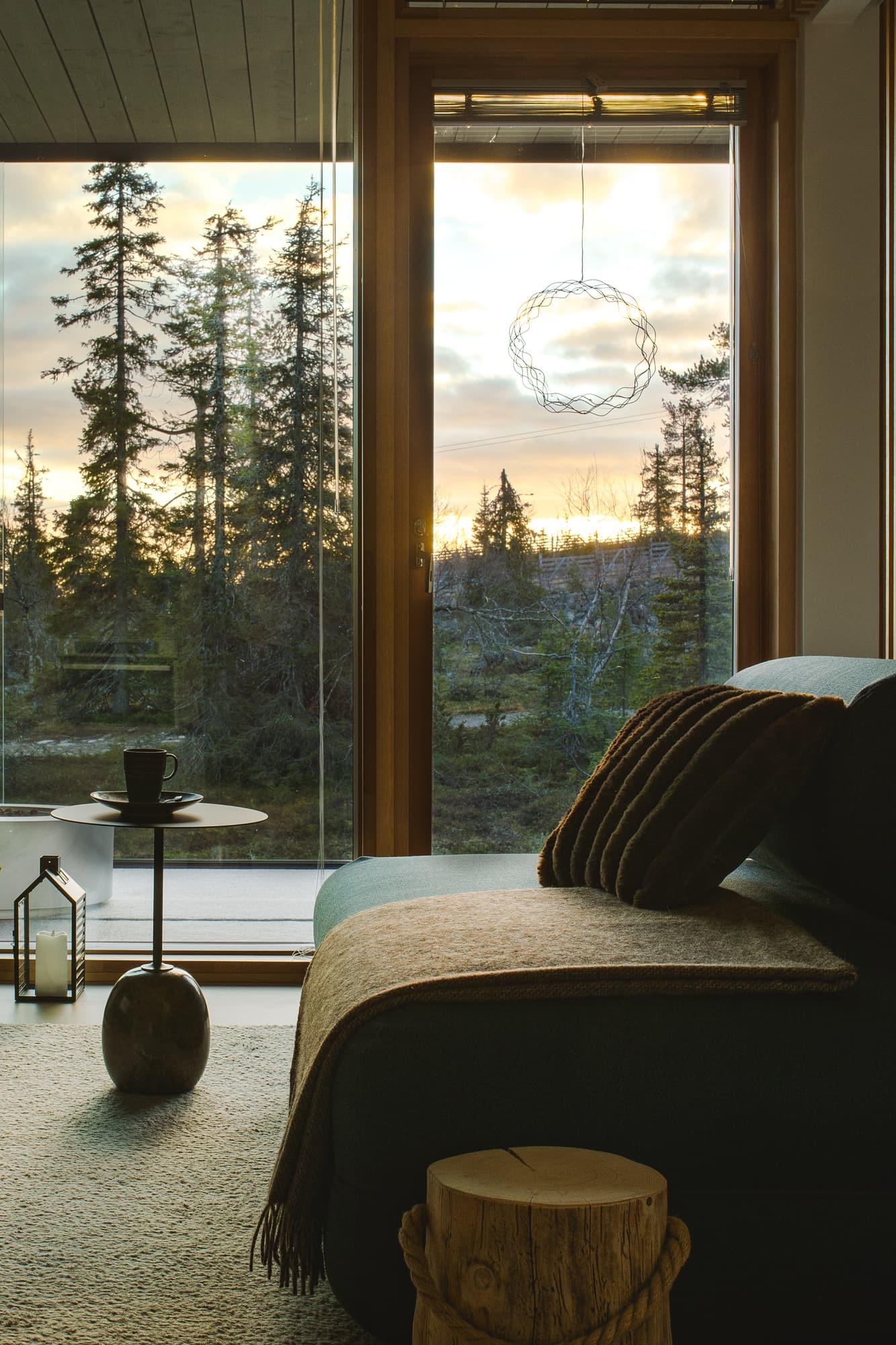 Sofa by the window at sunset