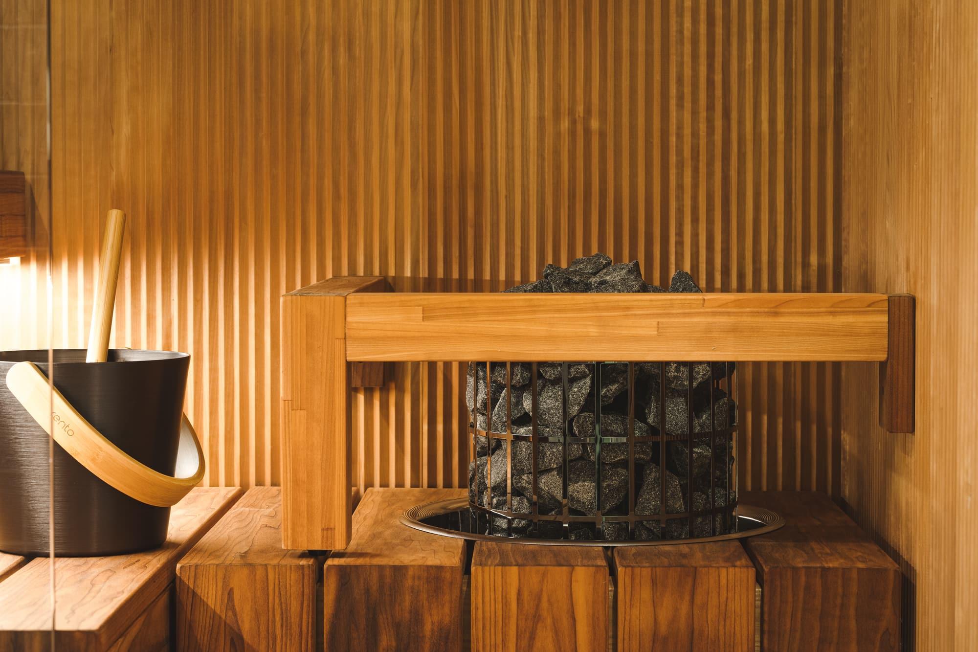 Private sauna with wooden benches
