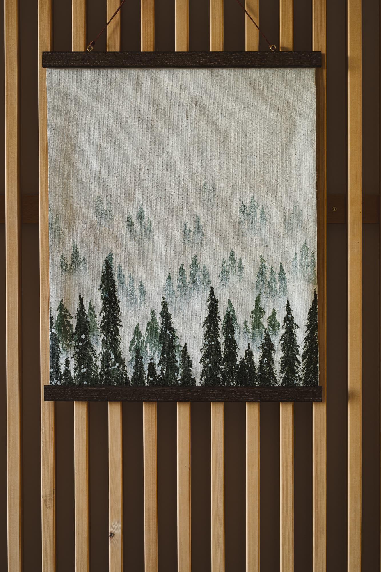 Forest artwork on the timber wall